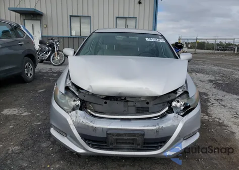 2010 Honda Insight Ex z USA, uszkodzony, nr VIN JHMZE2H79AS034030